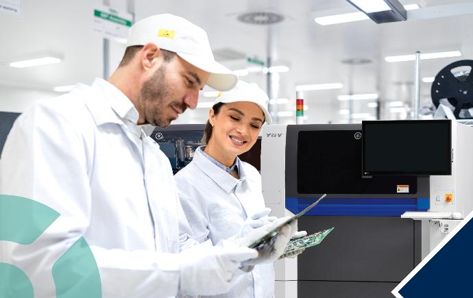 SMT line workers evaluating LED lights on boards