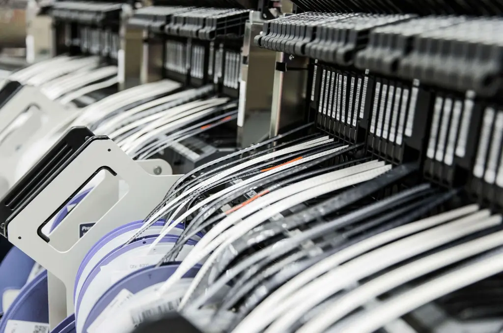 Row of Yamaha feeders setup for production with reels