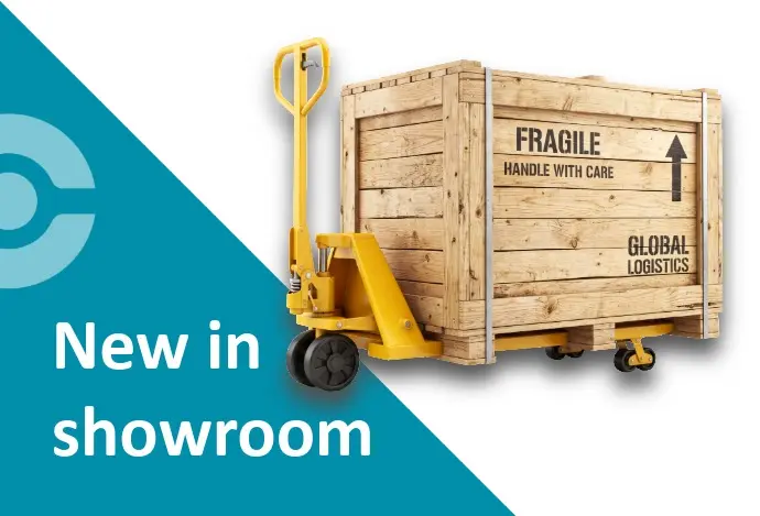 Liftfork with a box with the newest machine in our showroom