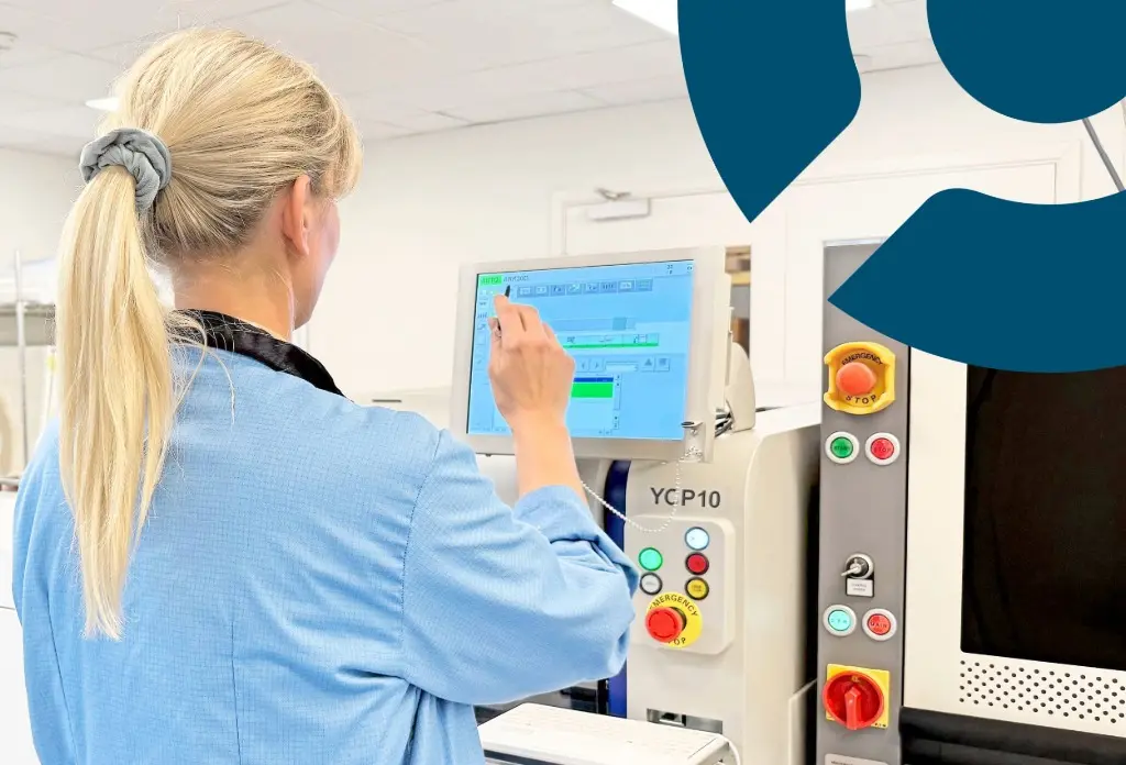 Operator with the solder printer at the Liftlogic SMT line