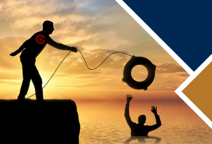 Two people silhouetted in the sunset, one on land, the other in the water. The man on land throws a lifebuoy to the man in the water, who grabs the ring.