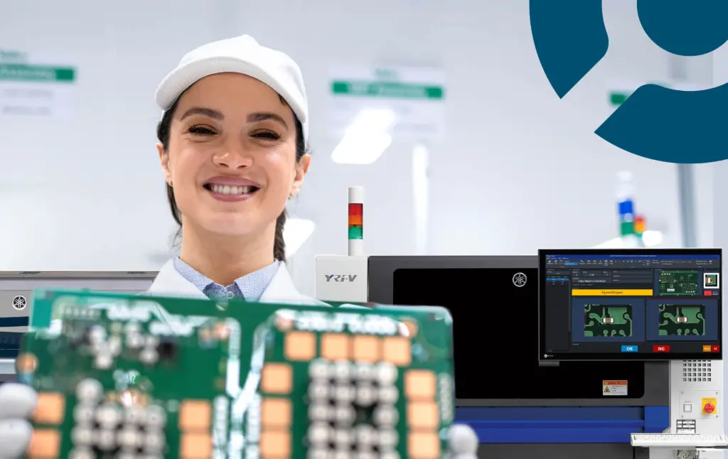 Female operator standing with a board infront of AOI machine