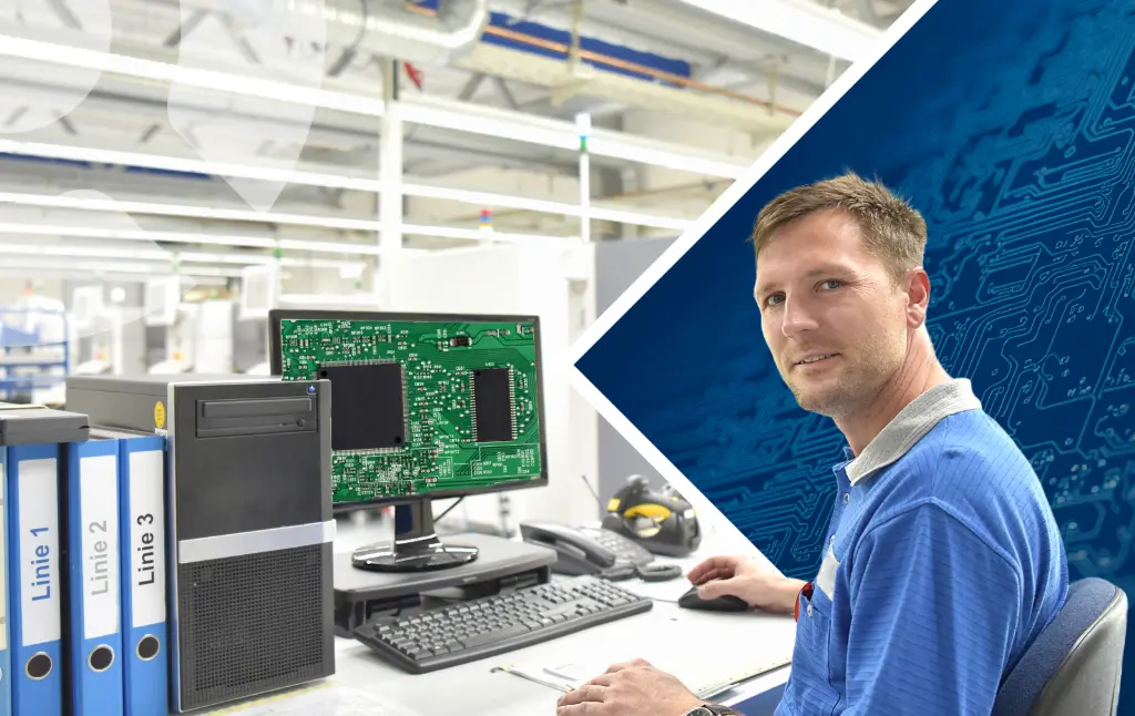 SMT process operator sitting at a computer assessing the SMT production